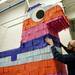 Spontaneous Art interactive performance artist Trevor Stone assembles a ten-foot-tall pi?ata on Friday, April 5. Daniel Brenner I AnnArbor.com